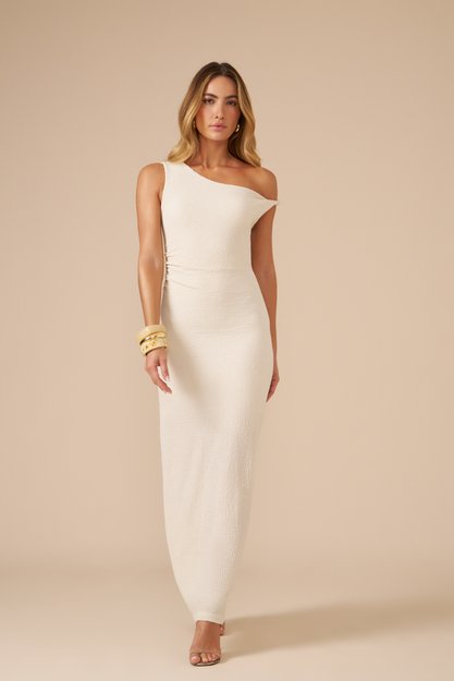 Vestido com textura, alça torcida e modelagem ajustada ao corpo.
